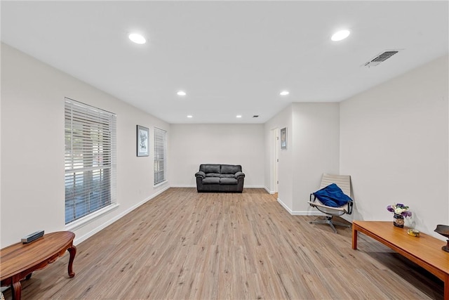 sitting room with light hardwood / wood-style floors