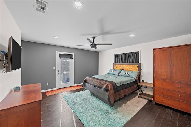 bedroom with access to exterior, ceiling fan, and dark wood-type flooring