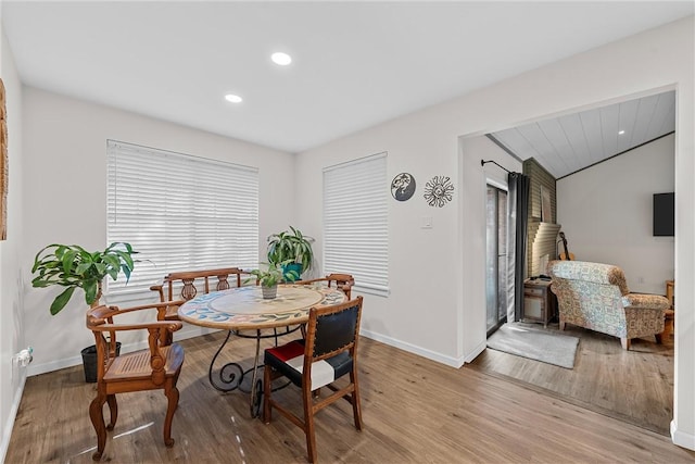 dining area with light hardwood / wood-style flooring