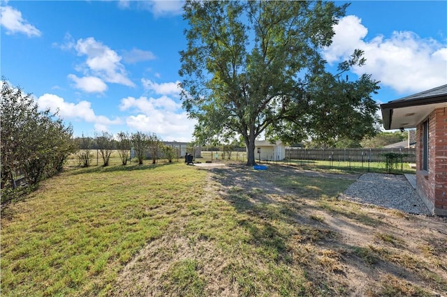 view of yard with a rural view