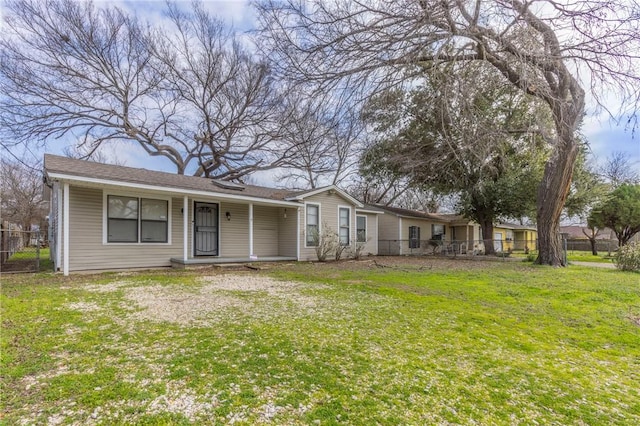 single story home featuring a front yard