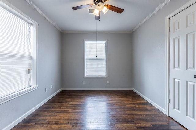 unfurnished room featuring crown molding, plenty of natural light, and dark wood-type flooring