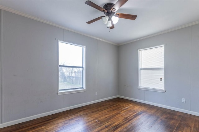 spare room with crown molding, ceiling fan, and dark hardwood / wood-style flooring