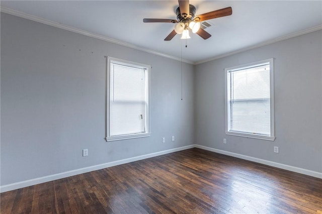 empty room featuring crown molding, dark hardwood / wood-style floors, and ceiling fan