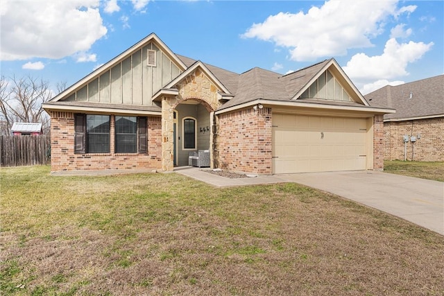 ranch-style home featuring a garage and a front lawn