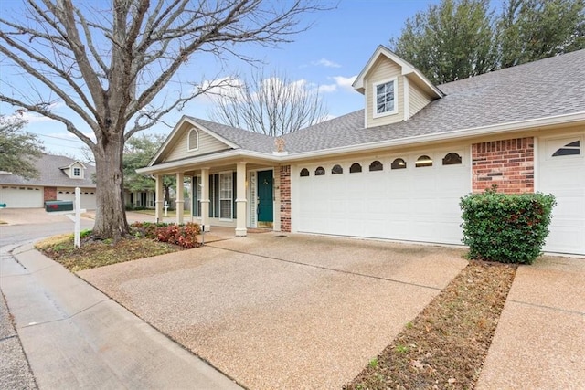 view of front of home featuring a garage and covered porch