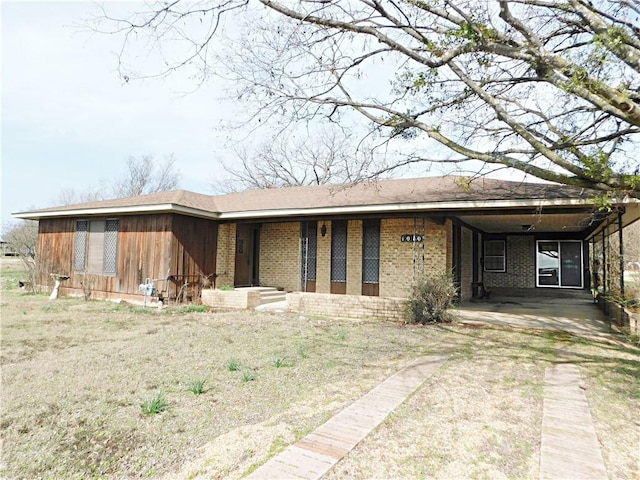 view of front of home with brick siding