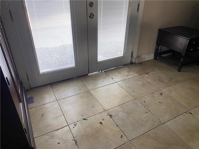 doorway to outside with french doors and plenty of natural light