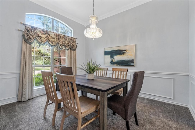 dining area featuring an inviting chandelier and ornamental molding