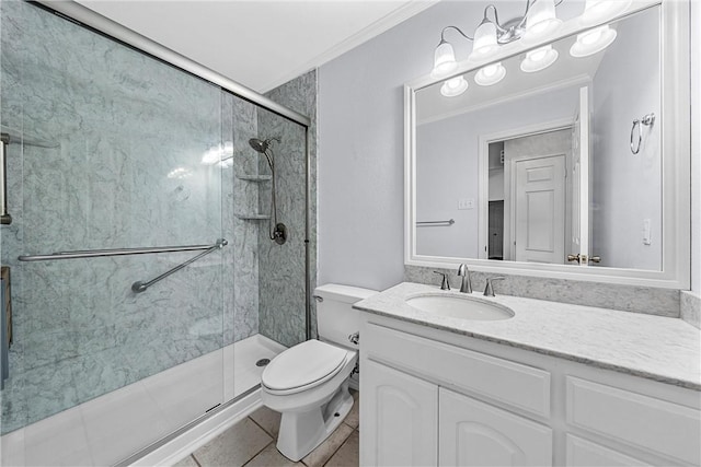 bathroom featuring ornamental molding, vanity, tile patterned flooring, toilet, and a shower with shower door