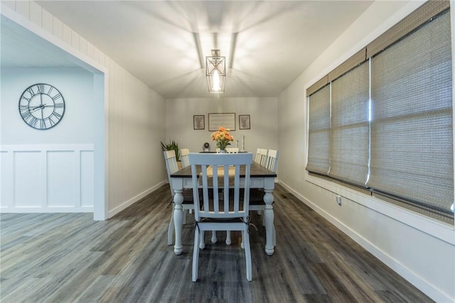 unfurnished dining area featuring dark hardwood / wood-style floors