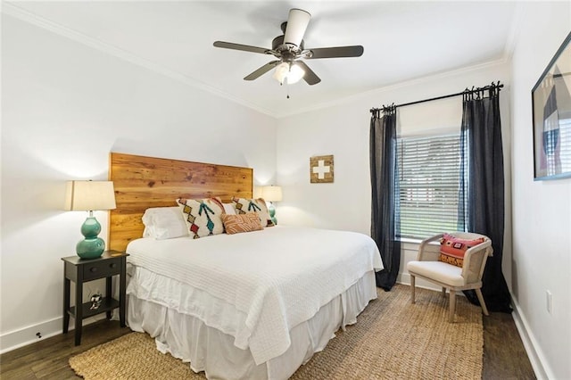 bedroom featuring ceiling fan, crown molding, and dark wood-type flooring