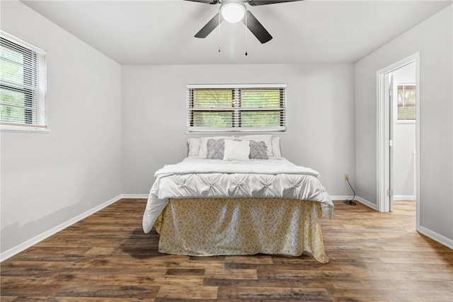 bedroom featuring hardwood / wood-style floors and ceiling fan