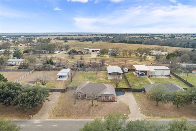 birds eye view of property featuring a rural view