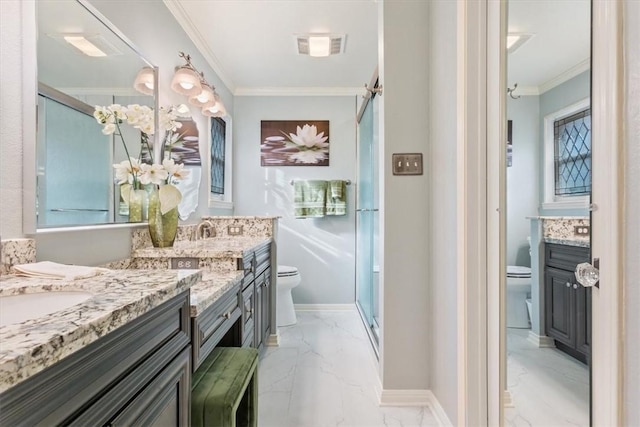 bathroom with crown molding, vanity, toilet, and a shower with shower door