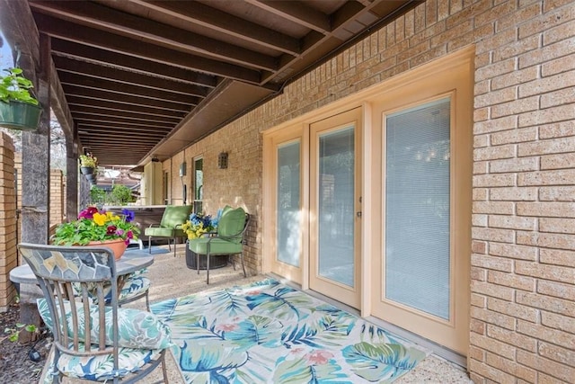 view of patio / terrace featuring a jacuzzi