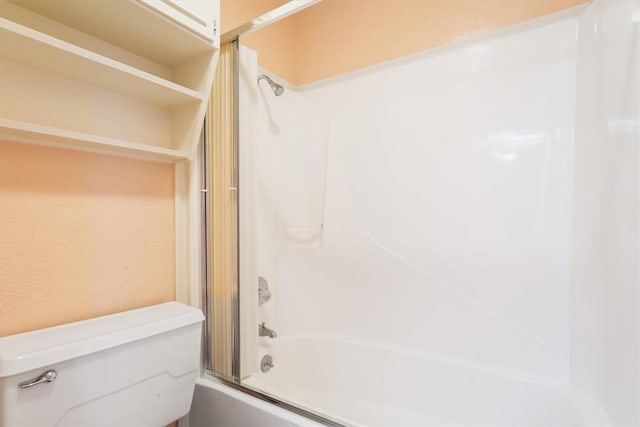 bathroom with shower / tub combination and toilet