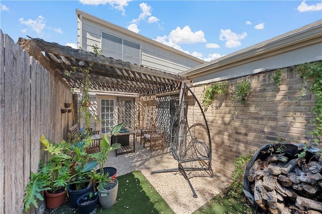 view of patio / terrace featuring a pergola