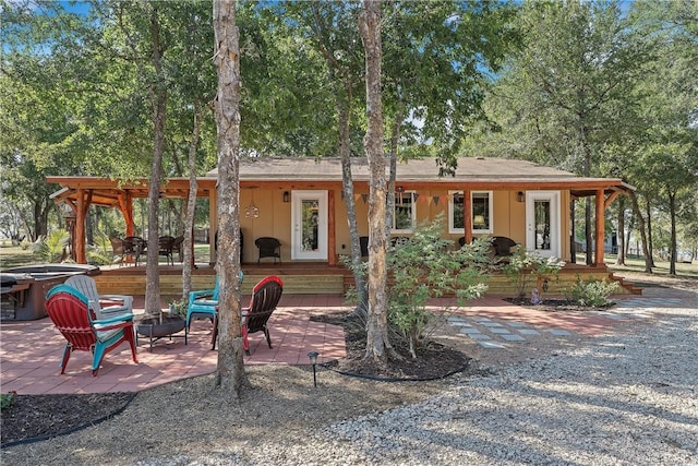 view of front of home with a patio area