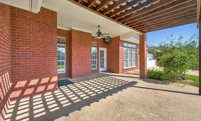 view of patio with ceiling fan