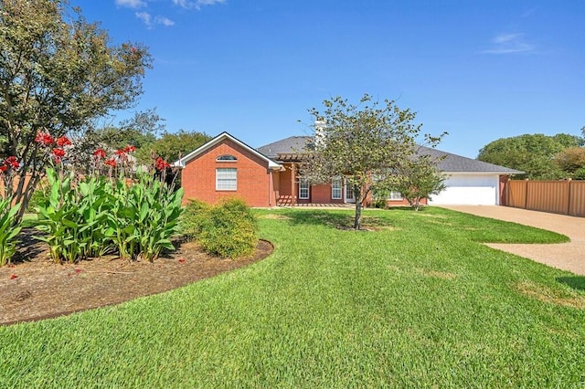 view of front facade featuring a front lawn and a garage