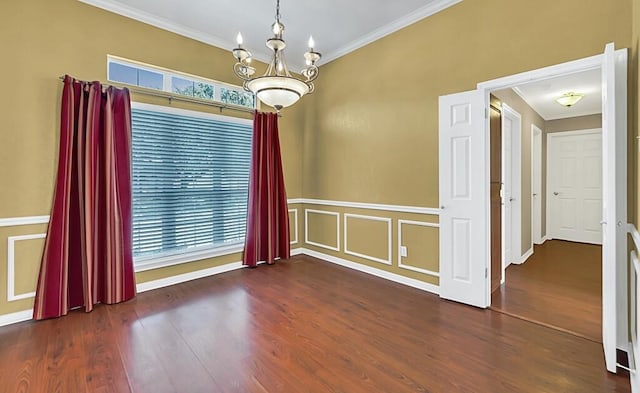 unfurnished room featuring dark hardwood / wood-style floors, plenty of natural light, and ornamental molding