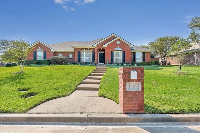 ranch-style home featuring a front lawn