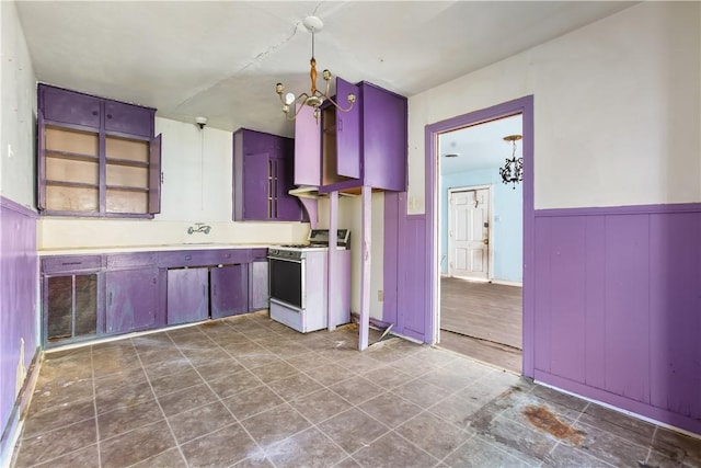 kitchen featuring white range with gas stovetop