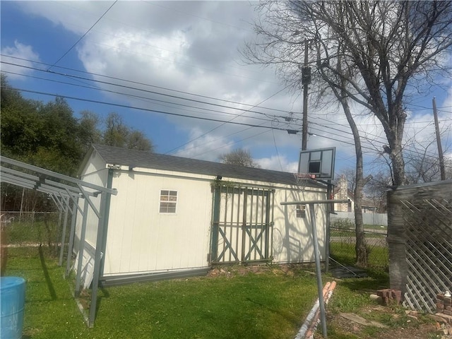 view of outdoor structure with a yard