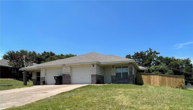 view of front of property with a garage and a front yard