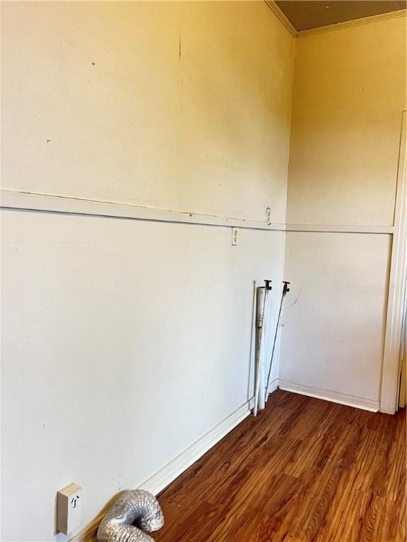 laundry room with dark hardwood / wood-style flooring