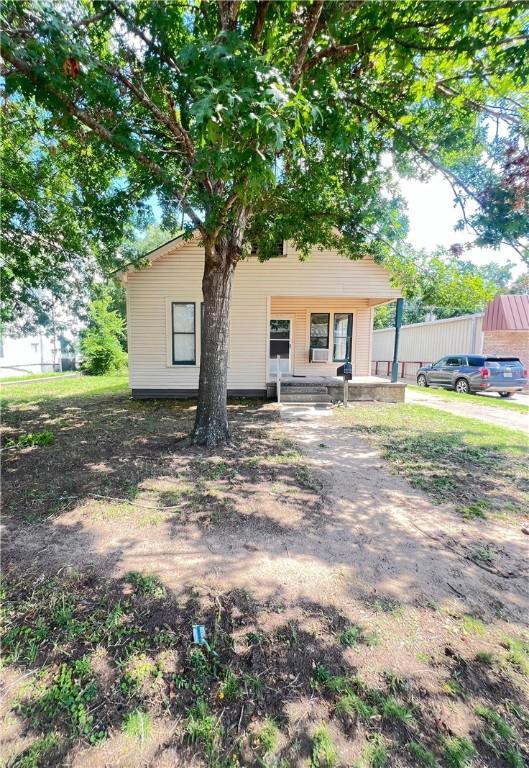 view of front of home featuring covered porch