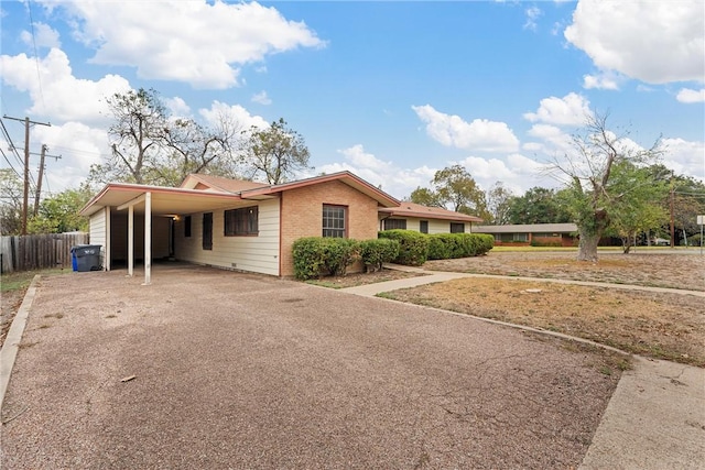 view of front of house with a carport