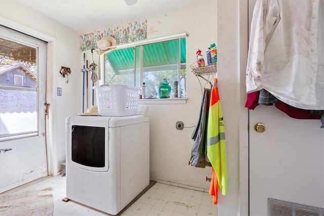 clothes washing area featuring washer / clothes dryer