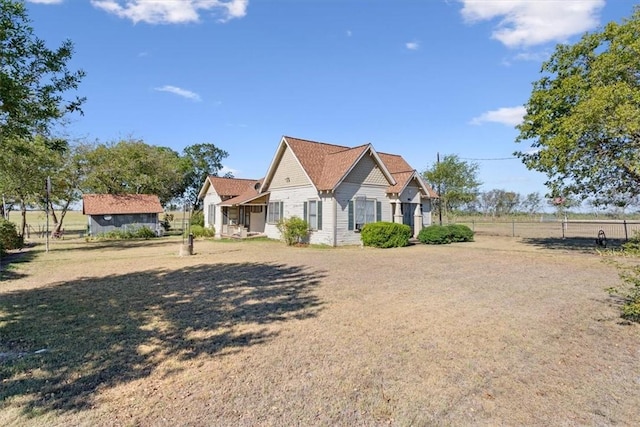 view of front of home with a front yard