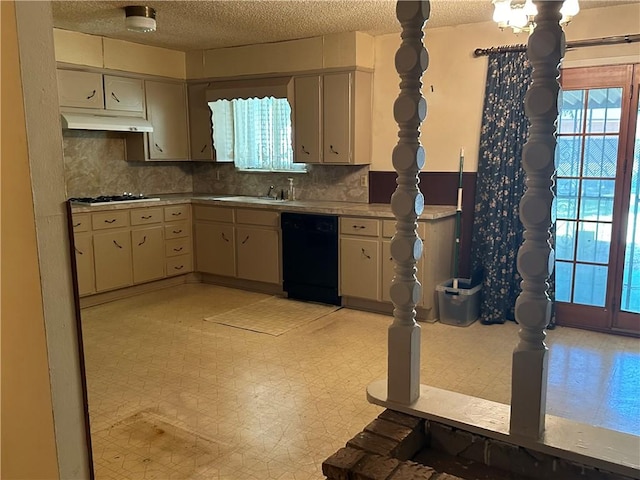 kitchen featuring gas cooktop, backsplash, sink, cream cabinets, and black dishwasher