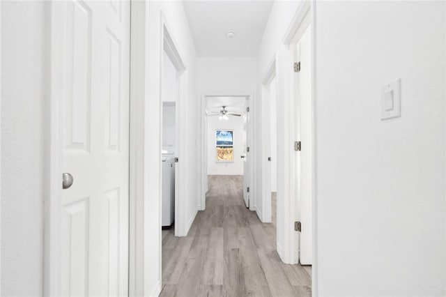 corridor featuring light hardwood / wood-style flooring