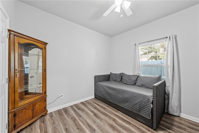 bedroom featuring ceiling fan and hardwood / wood-style floors