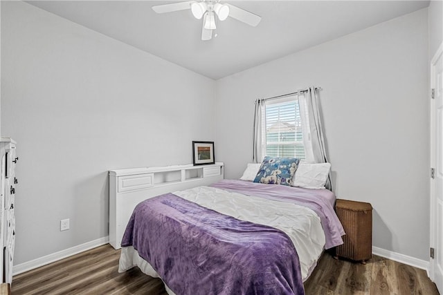 bedroom featuring dark wood-type flooring and ceiling fan