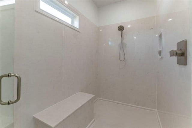 bathroom featuring walk in shower