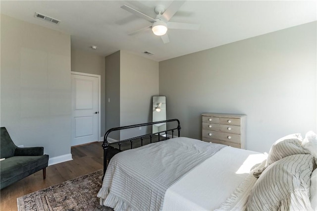 bedroom featuring ceiling fan and dark hardwood / wood-style flooring