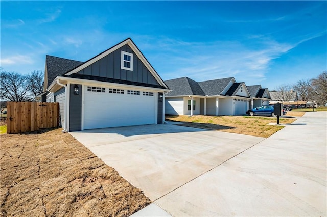 view of front of house featuring a front yard and a garage