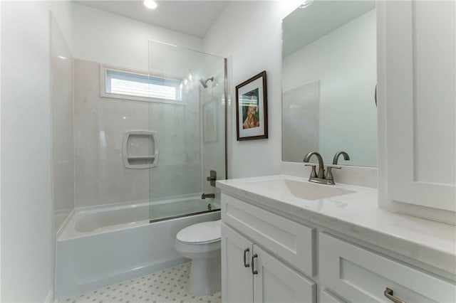 full bathroom featuring bathing tub / shower combination, vanity, and toilet