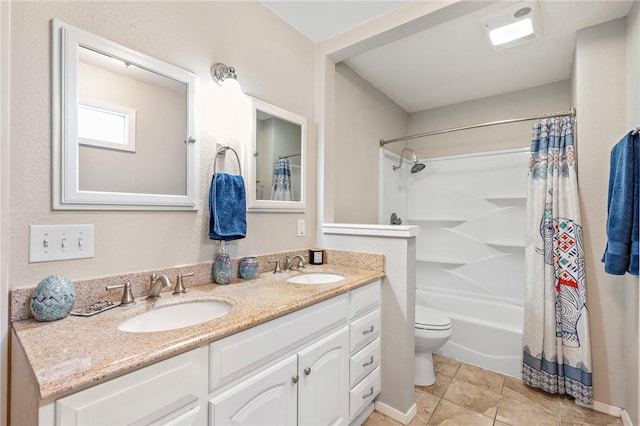 full bathroom featuring tile patterned flooring, vanity, toilet, and shower / bath combo with shower curtain