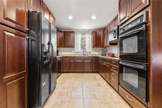 kitchen featuring sink and black appliances