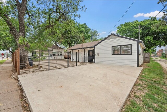 back of house with a patio area