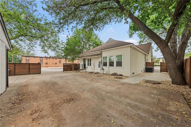 back of house with a patio area