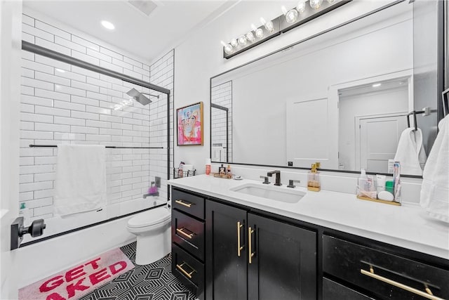 full bathroom featuring combined bath / shower with glass door, vanity, toilet, and tile patterned flooring