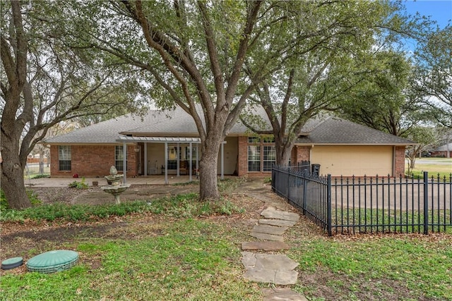 view of front of property with a garage