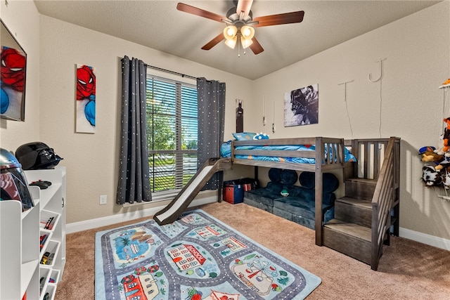 carpeted bedroom featuring ceiling fan